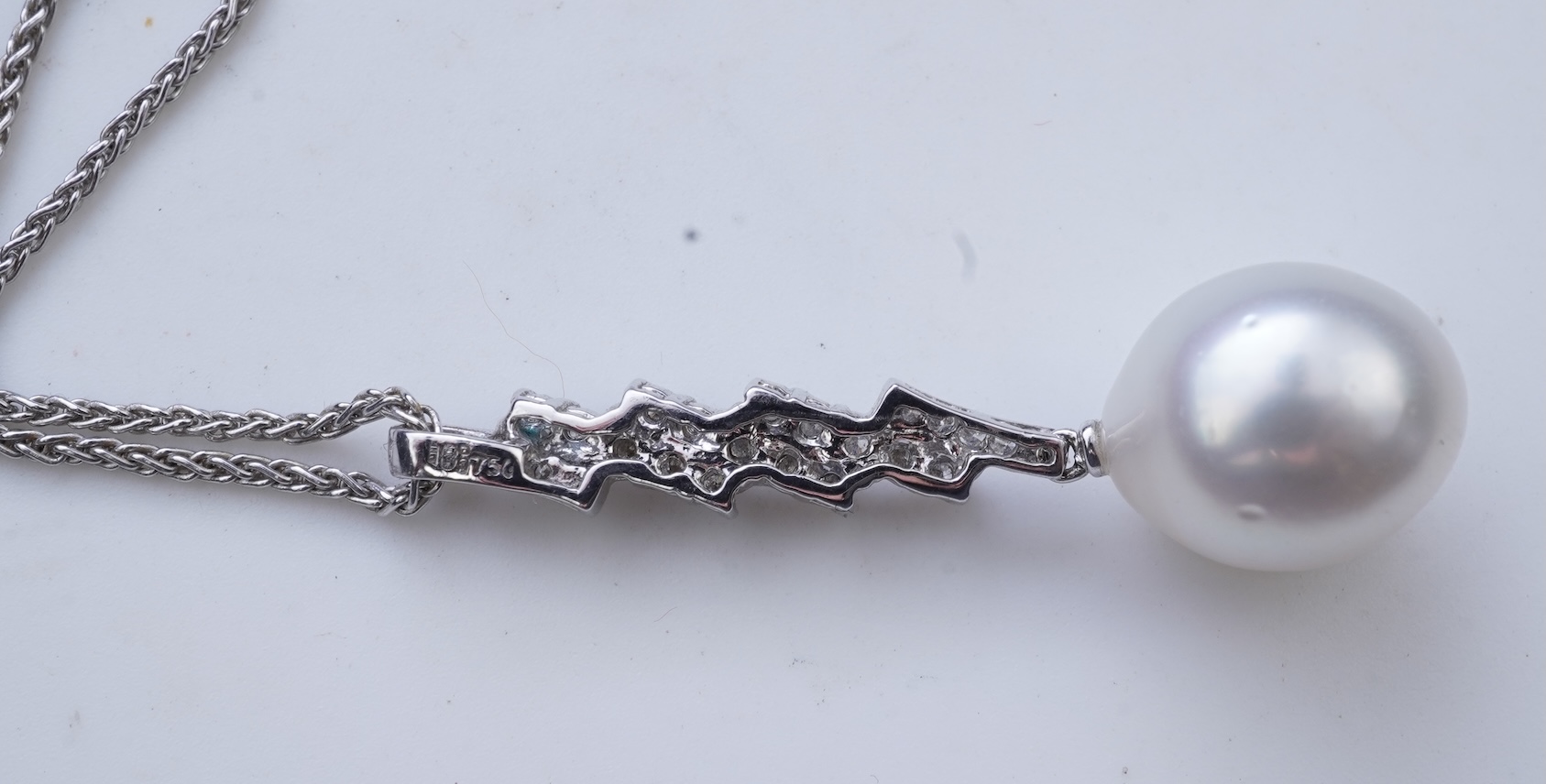 A diamond pendant necklace